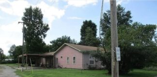 “Handyman’s Dream — Big Lot, Big Garage, and Big Potential in a Great Small Town!”