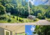 Wooded Hillside Retreat with Move-In-Ready Home and Acreage Near Pikeville
