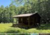 Bordering Daniel Boone National Forest: Secluded Acreage with Cabin, Pond, and Trail System in Southern Kentucky