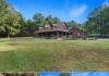 112-Acre Log Home Estate with Timber Land in Carterville, Illinois
