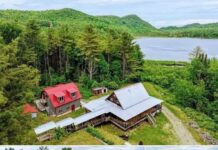 Peaceful retreat on 4.7 wooded acres with walk-out basement – $250,000.