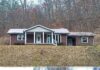 Spacious Brick Ranch Home on 2.45 Acres Featuring a Detached Garage, Generous Outdoor Space & Endless Potential for Comfortable Country Living