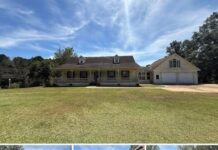 Spacious 4-Bedroom Home Nestled on 7 Private Acres Offering Comfort and Privacy