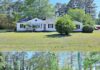 Prime 1+ Acre Investment Opportunity with Endless Potential