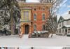 Priced at $150,000, this remarkable two-family residence in Auburn