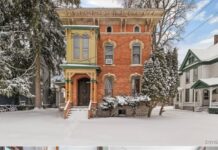 Priced at $150,000, this remarkable two-family residence in Auburn