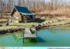 Secluded Off-Grid Cabin Retreat on Expansive Acreage Offering Privacy, Self-Sufficient Living & Natural Surroundings