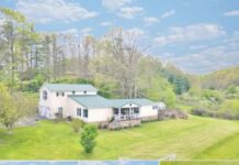 Roomy 5-bedroom home with a 3-car garage on 0.57 acres in Rock, WV