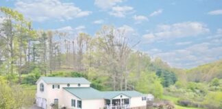 Roomy 5-bedroom home with a 3-car garage on 0.57 acres in Rock, WV