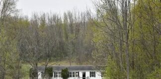 Prime 13.4-Acre Property Featuring a Large 4-Bedroom Residence