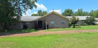 Expanded Valley Grande Retreat – 24 Acres, 4-Car Garage & Sunroom