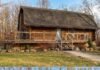 Private Log Cabin Retreat on 5 Scenic Acres Featuring a Pond, Pool, and Spacious Workshop