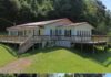 13-Acre Mountain Retreat with Creek, 4-Car Garage, and Attractive Seller Incentives