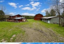 Expansive 15-Acre Country Retreat with Pond