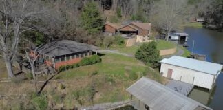 Waterfront Retreat with 400 Ft Shoreline & Boathouse – Move-In Ready on Lease Land $149,900