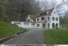 Classic Tudor Estate on 1.19 Acres with 5 Bedrooms, 3-Car Garage & Endless Potential