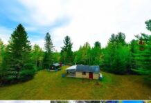 Camp with 100 Acres in Perronville, Michigan